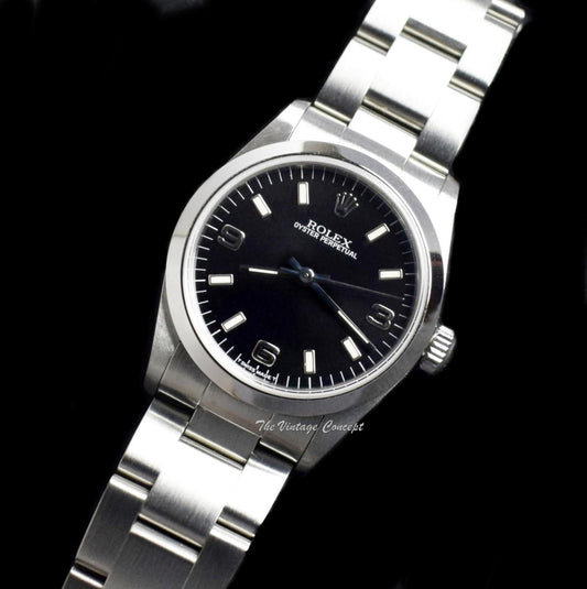 Rolex Steel Oyster Perpetual Black 3,6,9 Dial 67480  (SOLD)