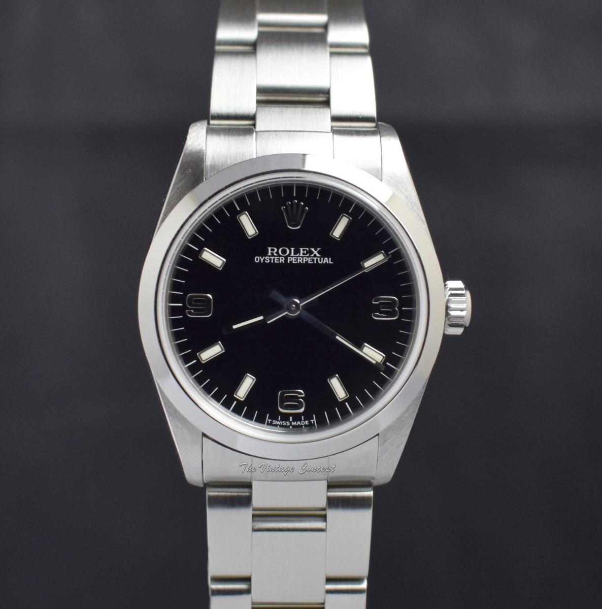 Rolex Steel Oyster Perpetual Black 3,6,9 Dial 67480  (SOLD)