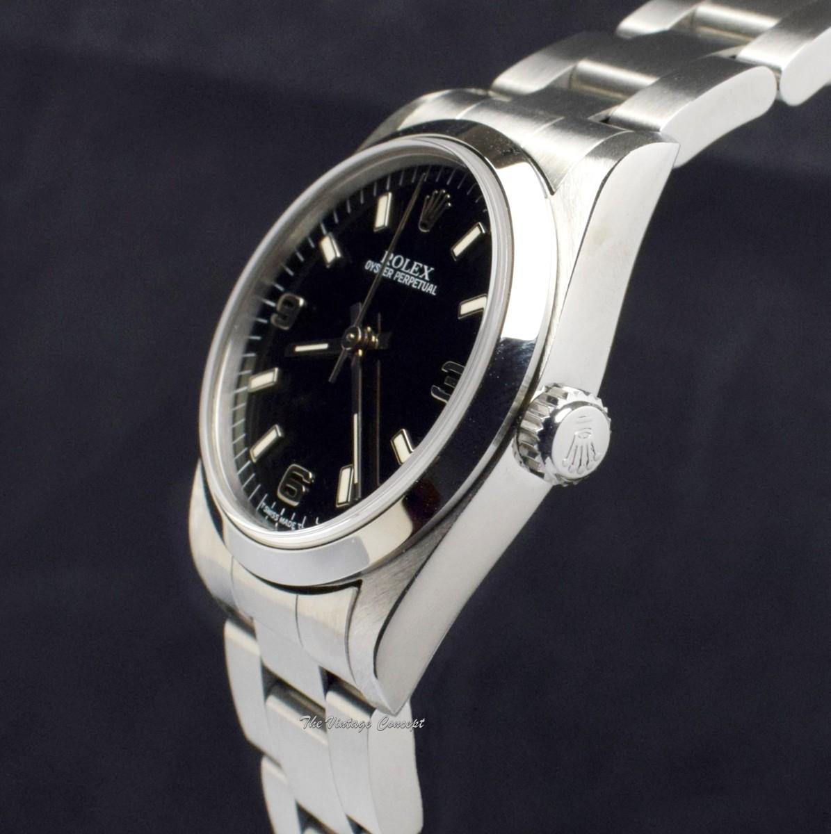 Rolex Steel Oyster Perpetual Black 3,6,9 Dial 67480  (SOLD)