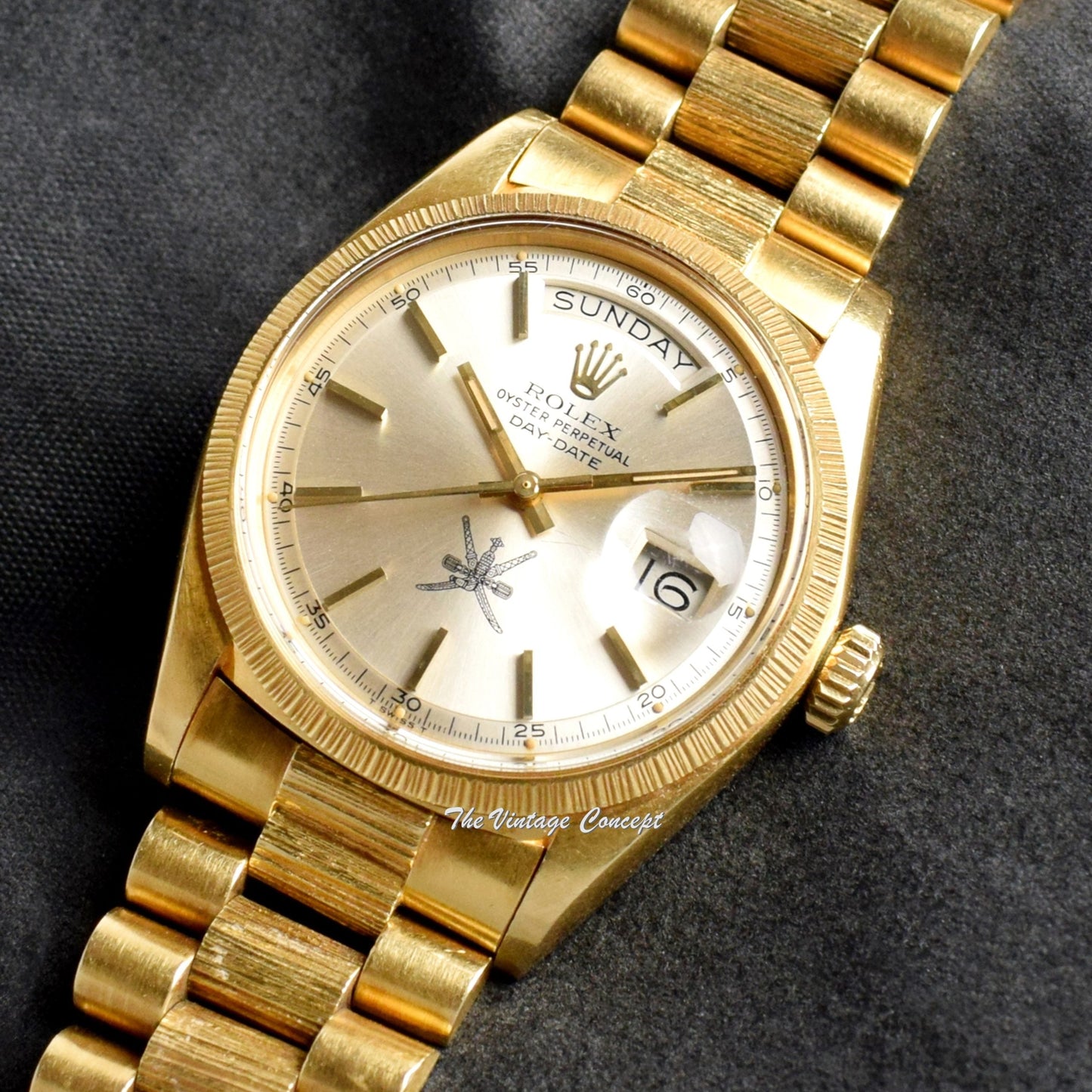 Rolex Day-Date 18K YG Bark Finish Silver Dial Omani 1807 (SOLD)