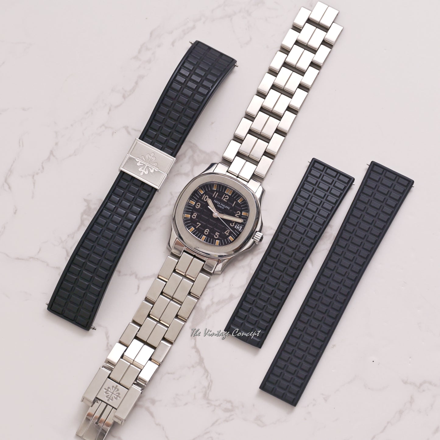 Patek Philippe Steel Aquanaut Black Dial with Steel Bracelet and Rubber Strap w/ original paper Ref. 5066A-001