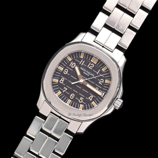 Patek Philippe Steel Aquanaut Black Dial with Steel Bracelet and Rubber Strap w/ original paper Ref. 5066A-001