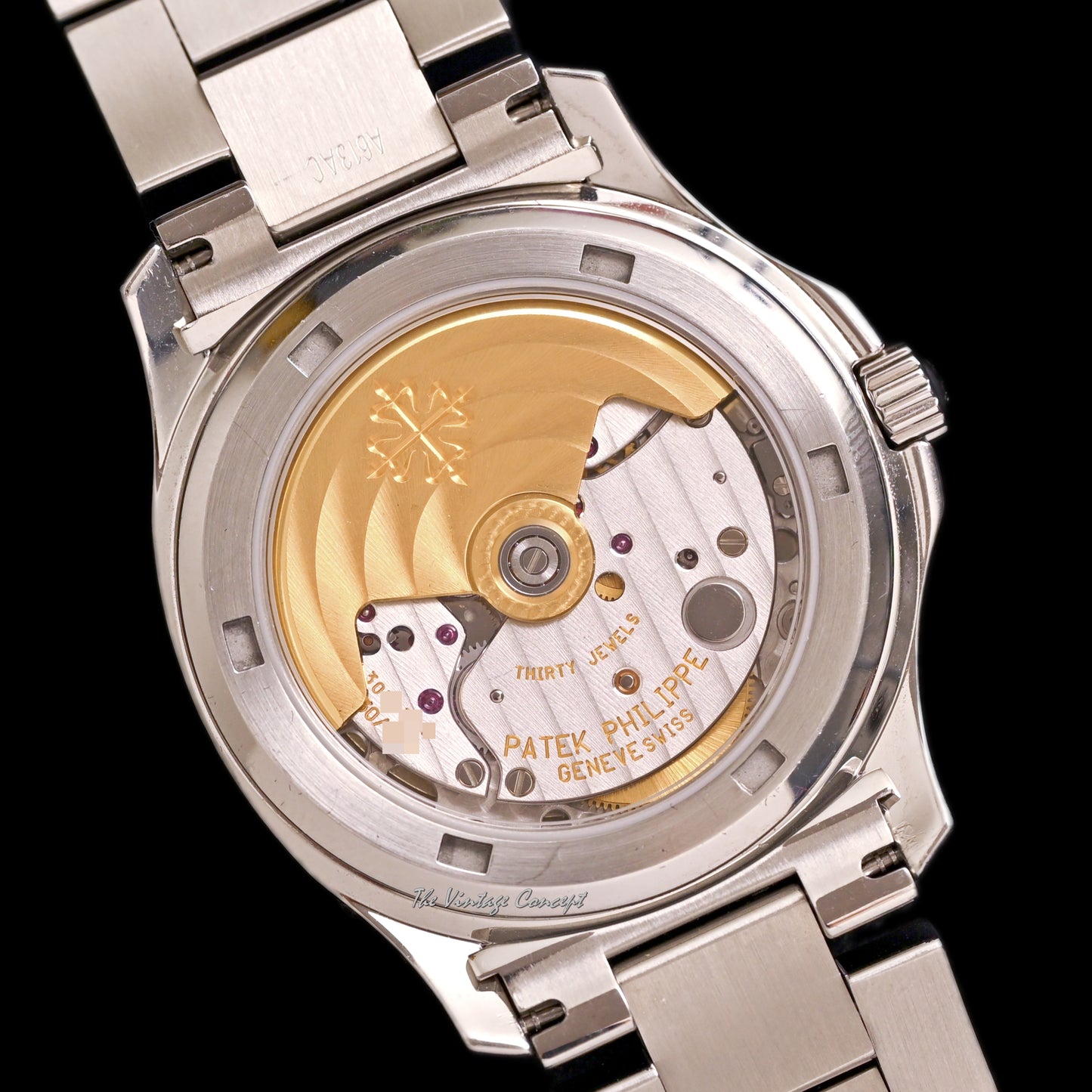 Patek Philippe Steel Aquanaut Black Dial with Steel Bracelet and Rubber Strap w/ original paper Ref. 5066A-001