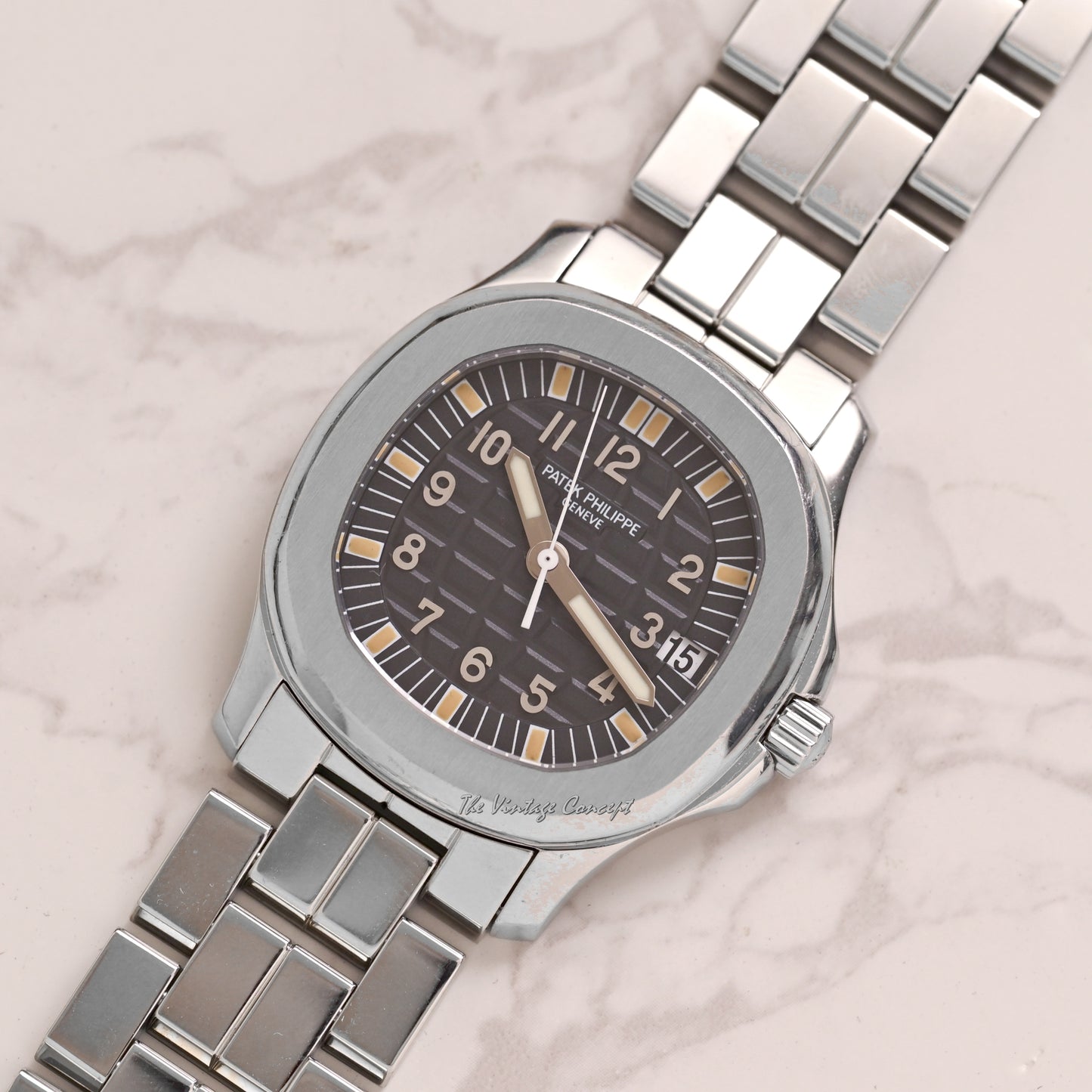 Patek Philippe Steel Aquanaut Black Dial with Steel Bracelet and Rubber Strap w/ original paper Ref. 5066A-001