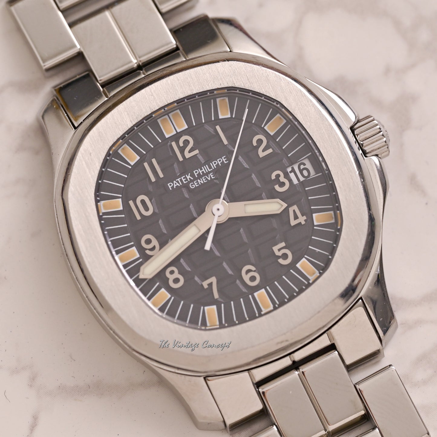 Patek Philippe Steel Aquanaut Black Dial with Steel Bracelet and Rubber Strap w/ original paper Ref. 5066A-001