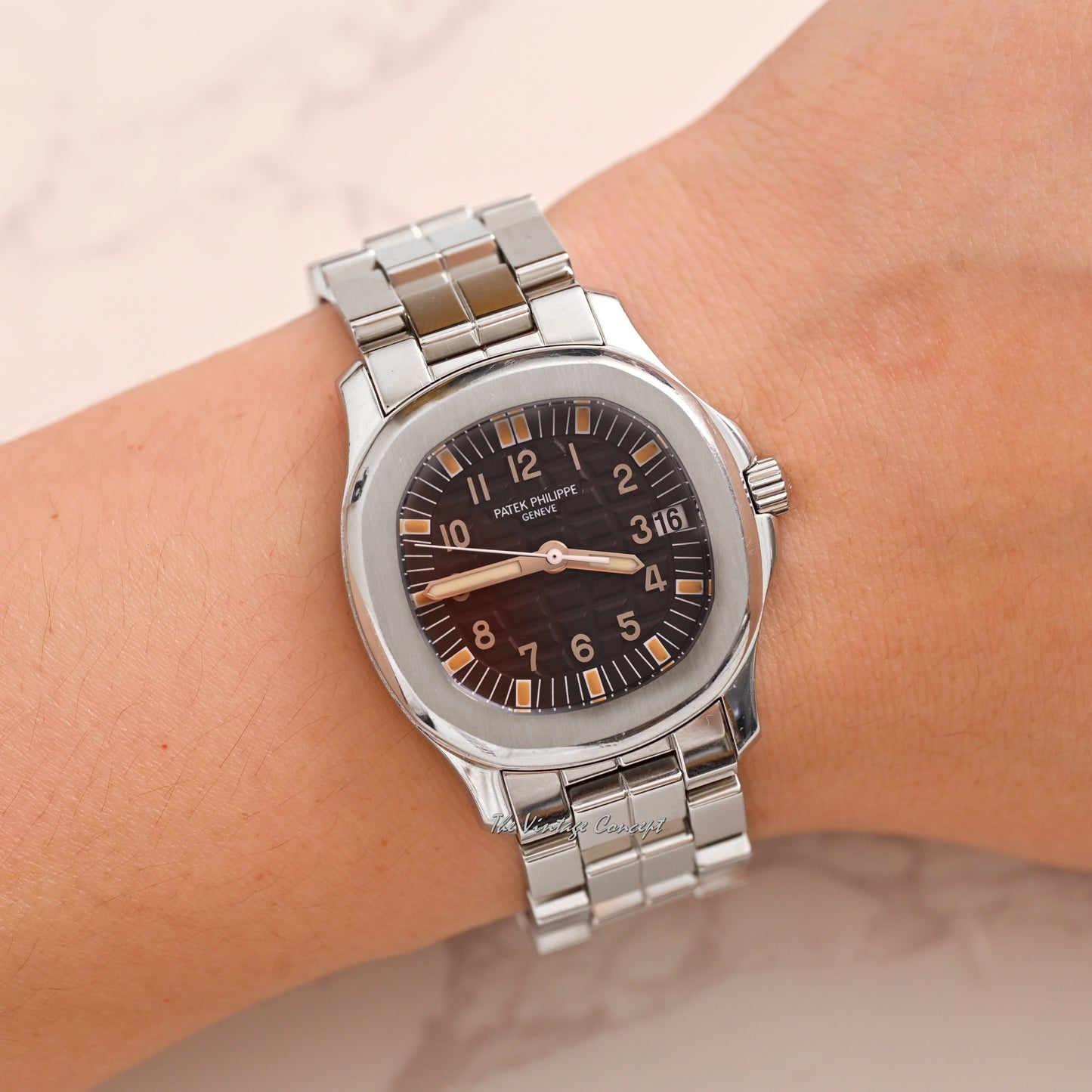 Patek Philippe Steel Aquanaut Black Dial with Steel Bracelet and Rubber Strap w/ original paper Ref. 5066A-001