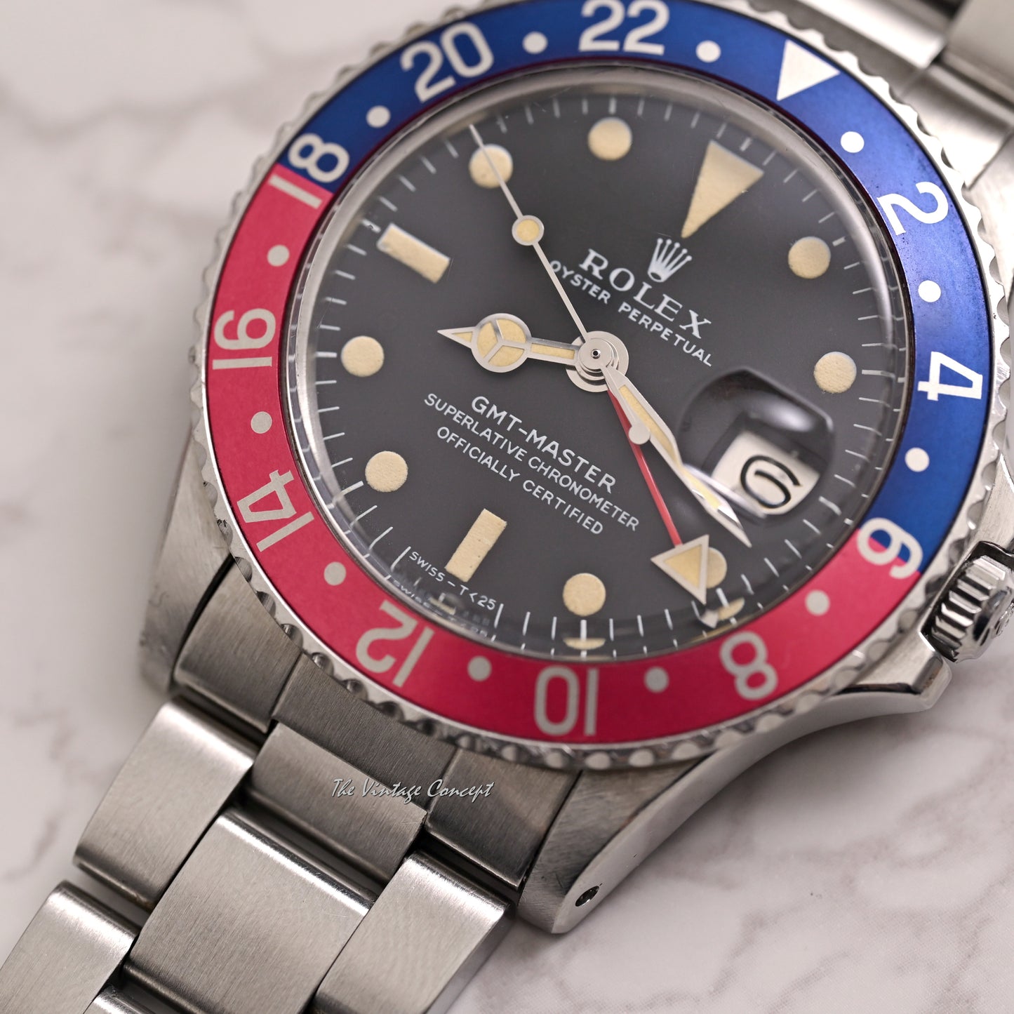 Rolex Steel GMT-Master “Pepsi” Long E Matte Dial w/ service paper Ref. 1675