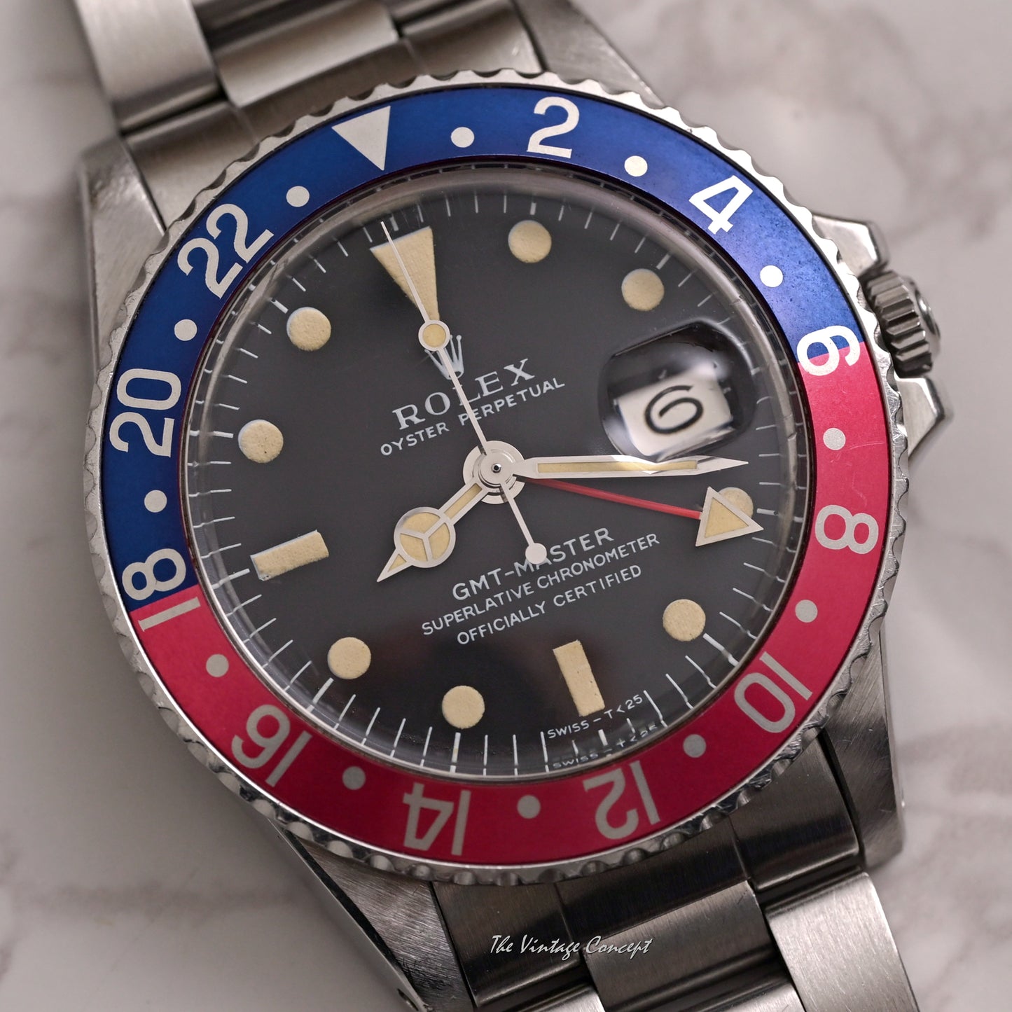 Rolex Steel GMT-Master “Pepsi” Long E Matte Dial w/ service paper Ref. 1675