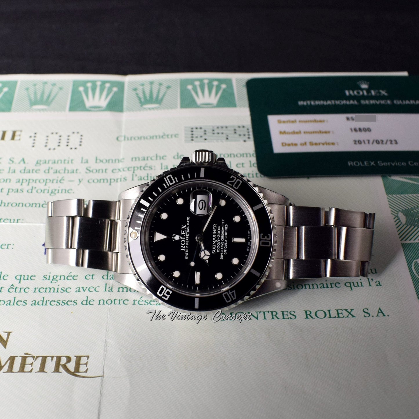 Rolex Submariner 168000 w/ Original Paper & Service Card (SOLD)