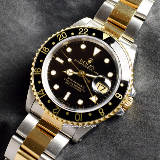 Rolex GMT-Master II Two-Tone Black Dial 16713 w/ Original Paper  (SOLD)