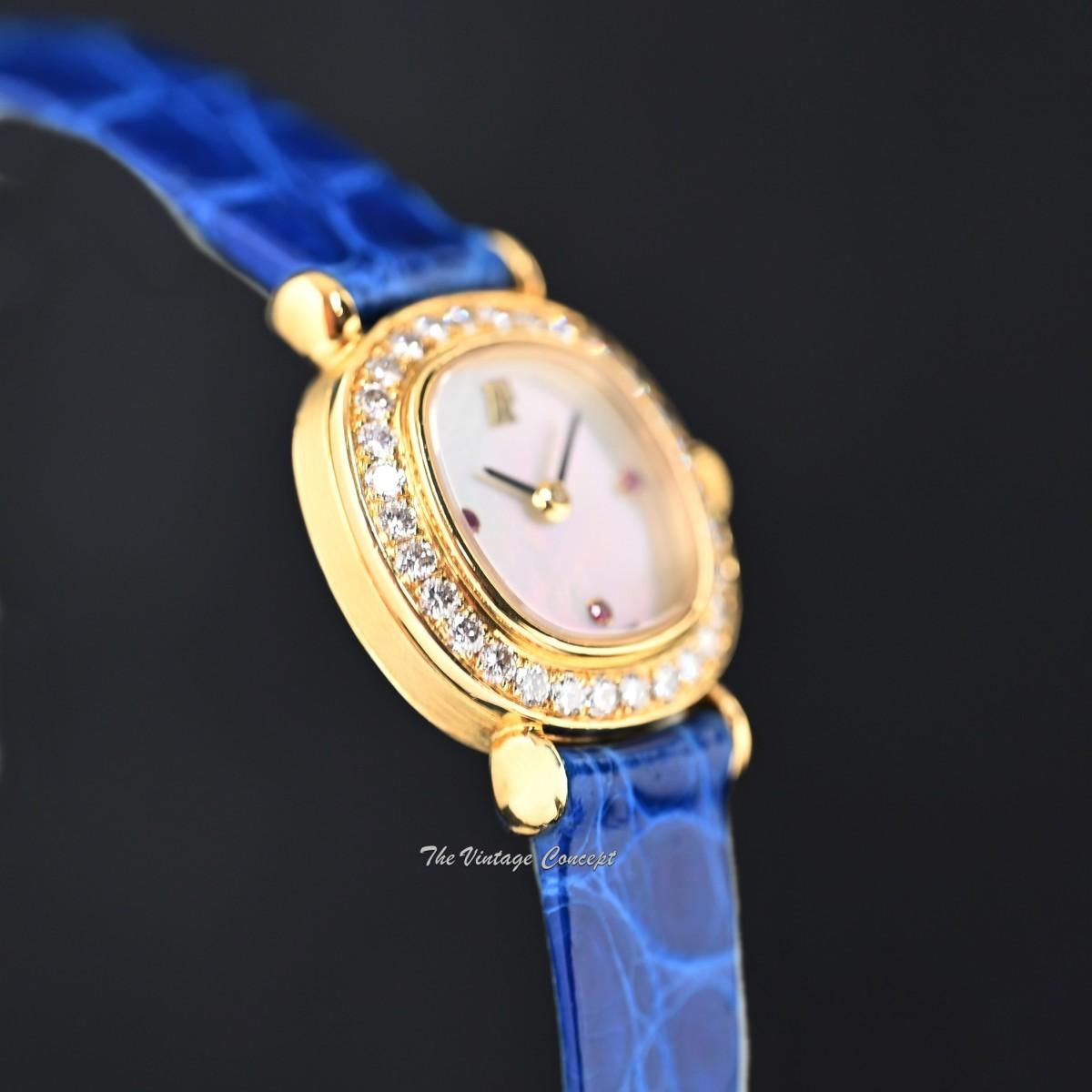 Audemars Piguet Lady 18K Yellow Gold Mother of Pearl Dial Ruby Indexes Diamonds Manual 77150BA w/ Original Paper  (SOLD)