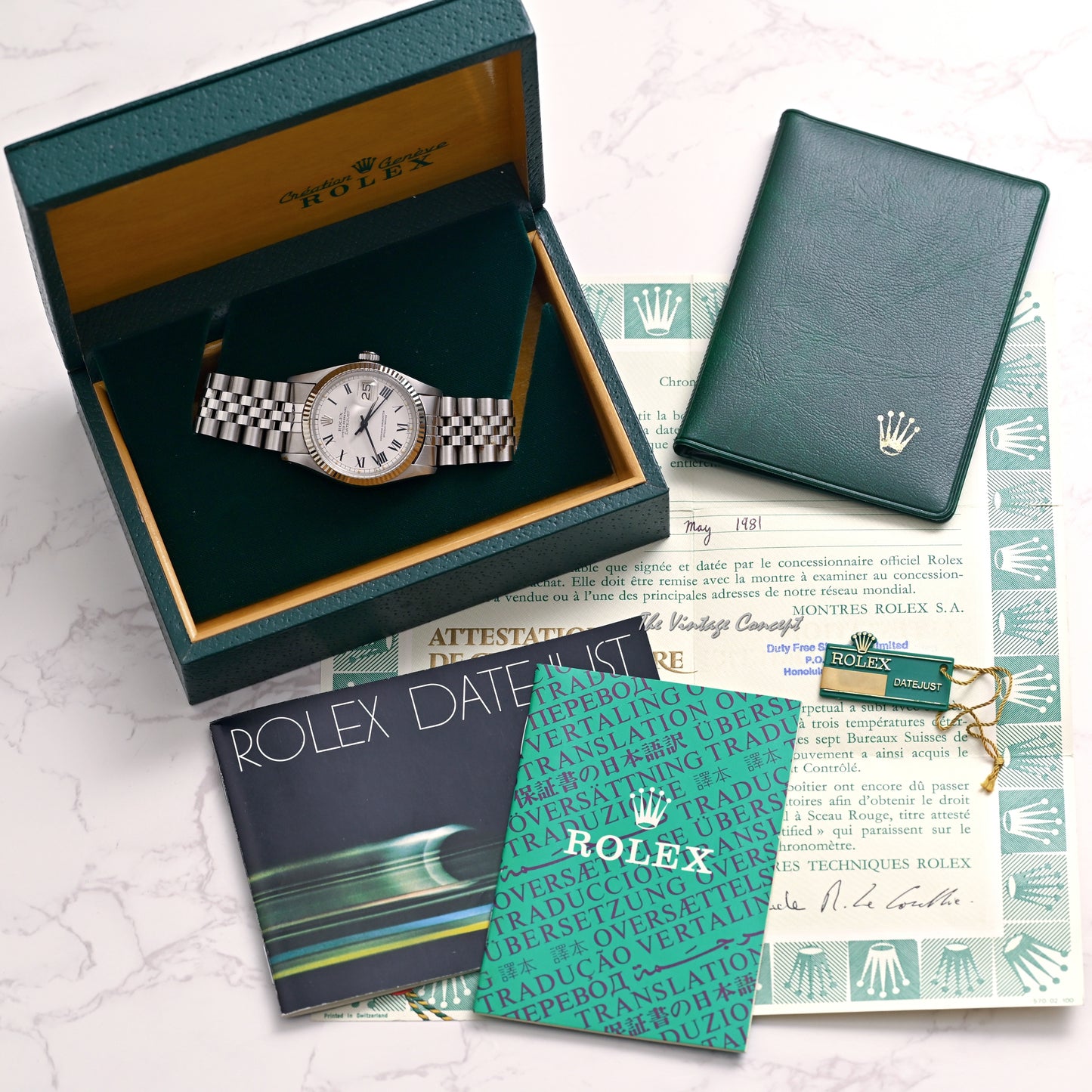 Rolex Steel Datejust White Dial with Black Roman Indexes (Buckley) w/ Box set & Paper Ref. 16014