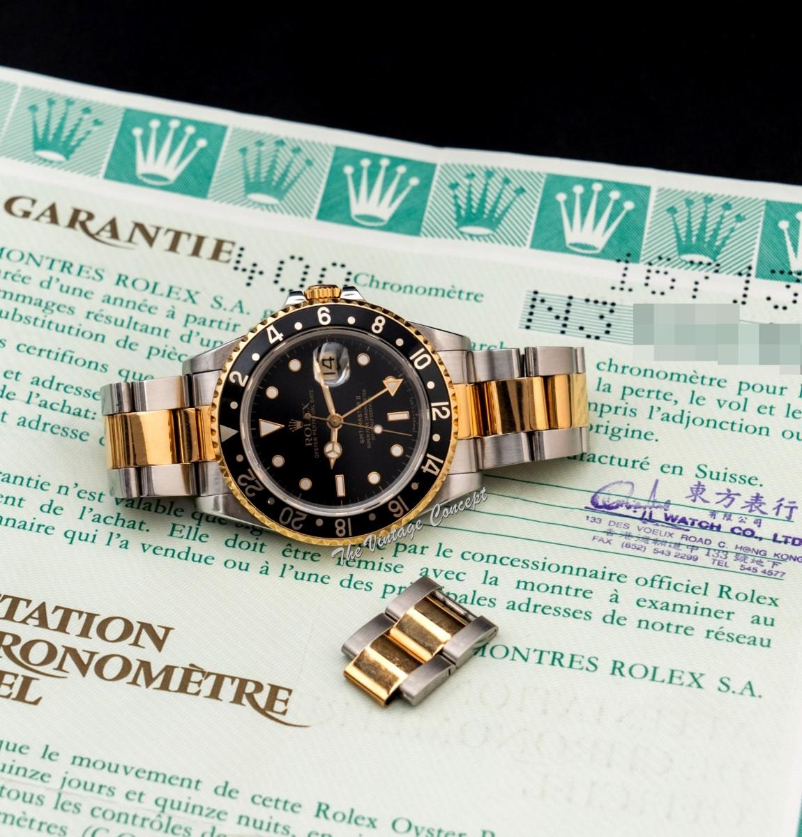 Rolex GMT-Master II Two-Tone Yellow Gold & Steel Black Dial 16713 w/ Original Paper  (SOLD)