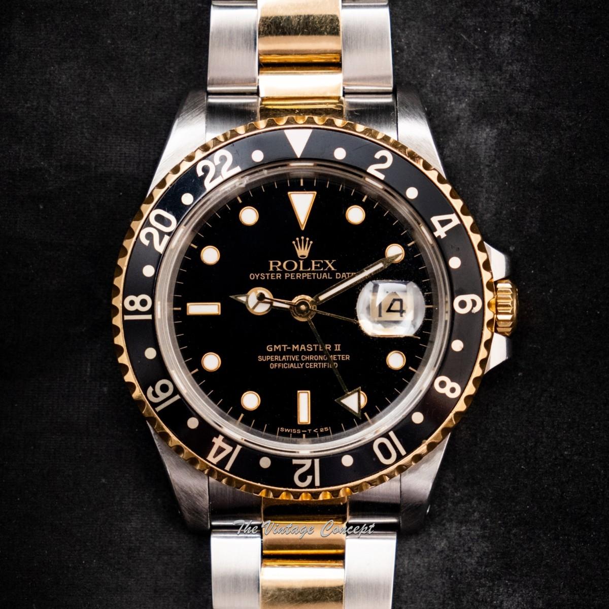 Rolex GMT-Master II Two-Tone Yellow Gold & Steel Black Dial 16713 w/ Original Paper  (SOLD)