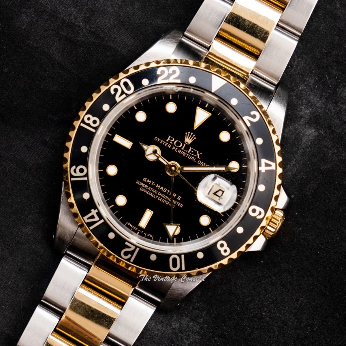 Rolex GMT-Master II Two-Tone Yellow Gold & Steel Black Dial 16713 w/ Original Paper  (SOLD)