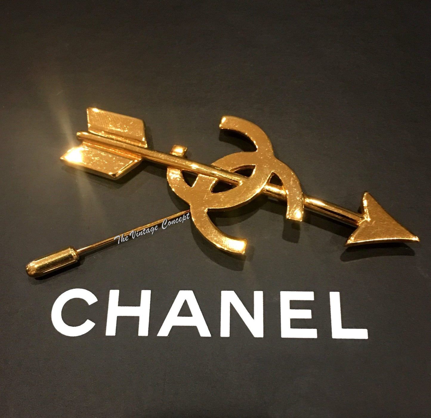 Chanel Gold Tone Arrow Logo Pin from 1992 (SOLD)