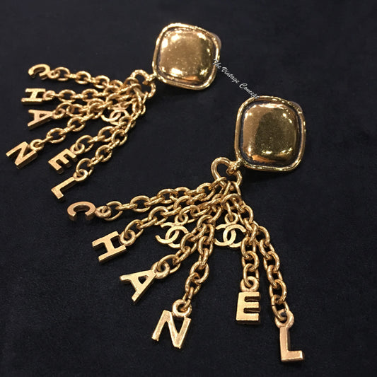 Chanel Gold Tone Diamond Shape Dangle C-H-A-N-E-L Clip Earring from 80's