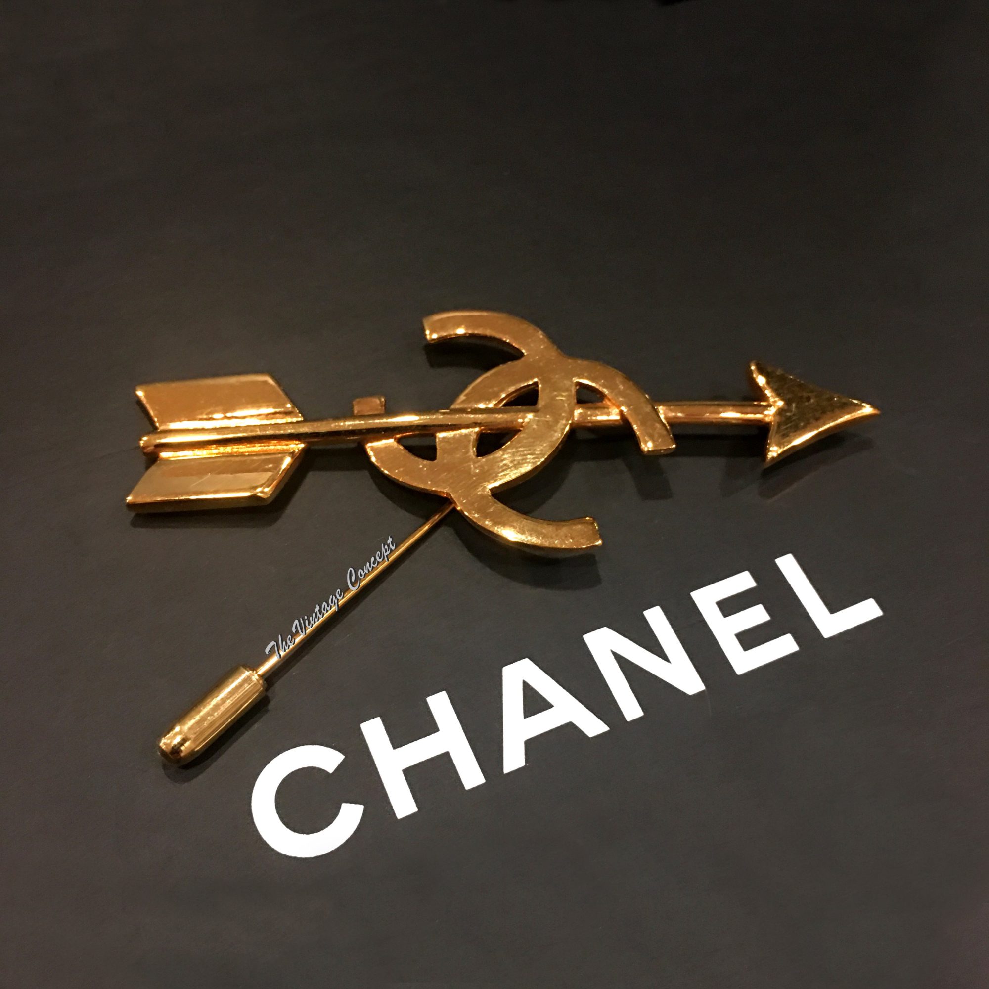 Chanel Gold Tone Arrow Logo Pin from 1992 (SOLD) - The Vintage Concept
