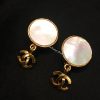 Chanel Gold Tone Mother of Pearl Dangle Logo Clip Earrings 95A (SOLD)