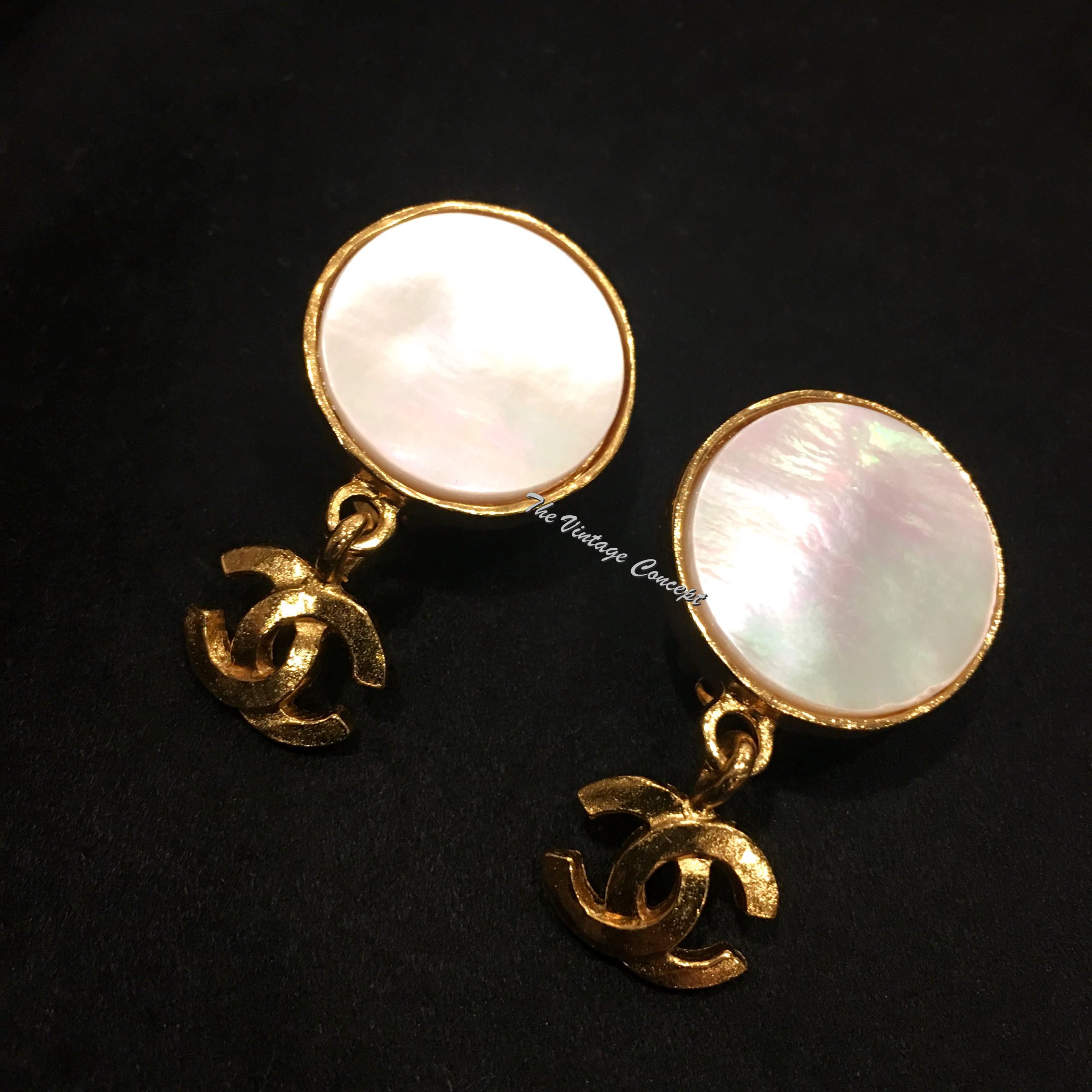Chanel Gold Tone Mother of Pearl Dangle Logo Clip Earrings 95A