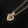 Dior Gold Tone “Dior” Heart Shape w/ Rhinestones necklace  (SOLD)
