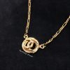 Chanel Gold Tone Small Pendant Chanel Logo Necklace 1983  (SOLD)