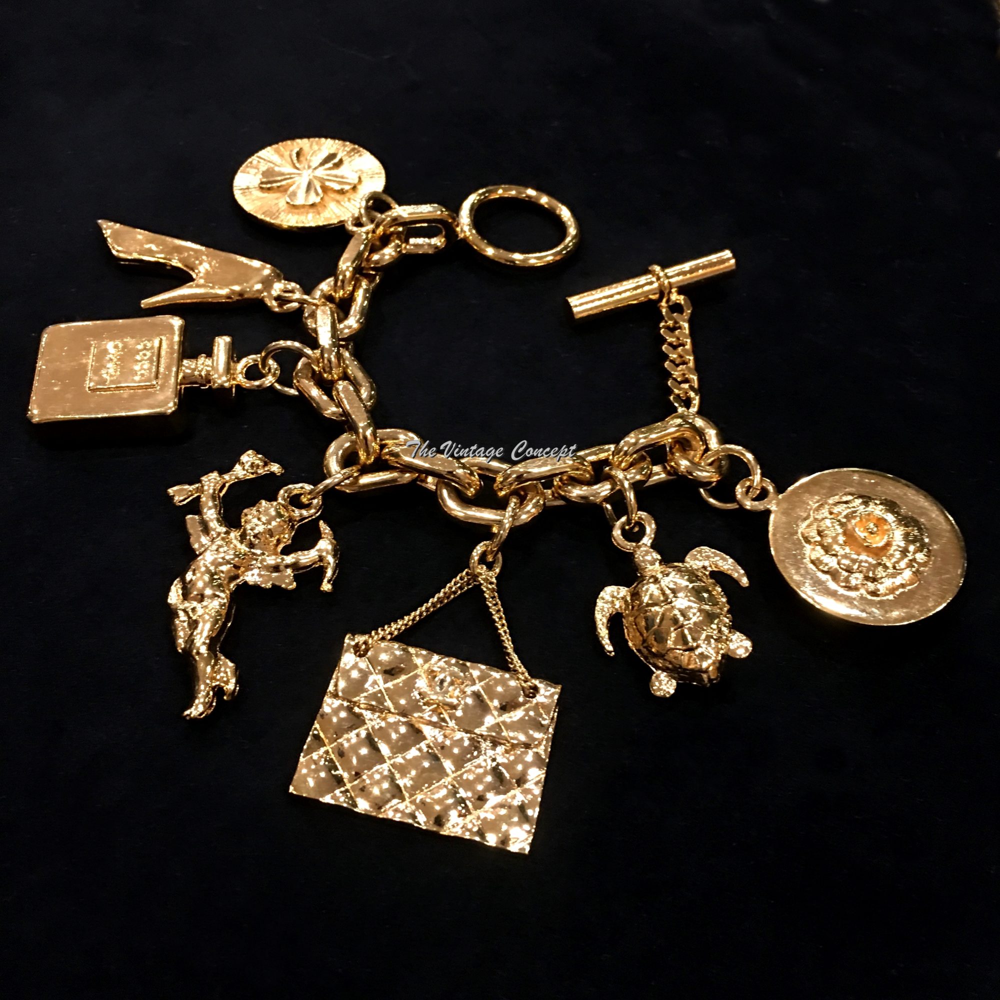 Vintage Chanel Gold Tone Heavy Charm Bracelet from 70-80's - The Vintage Concept