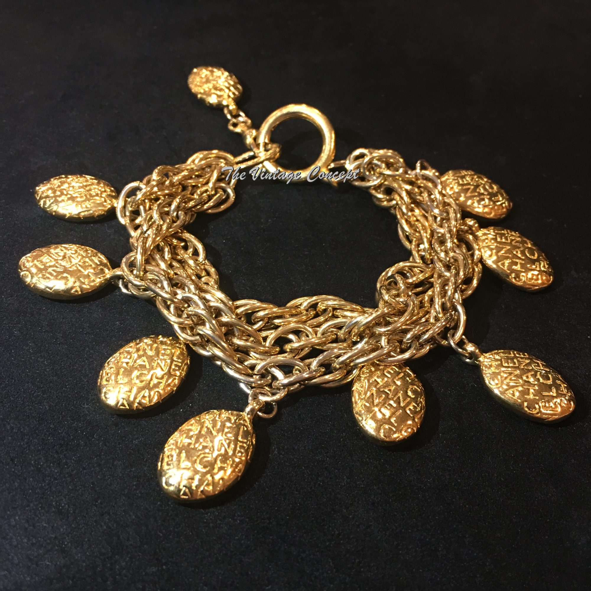 Chanel Gold Tone Multi Strand Charm Logo Bracelet from 80's (SOLD) - The Vintage Concept