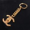 Chanel Gold Tone Turn Lock Key Chain 96A