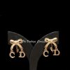 Dior Gold Tone “CD” Ribbon Clip Earring