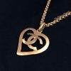 Chanel Gold Tone Heart Shape Logo Necklace