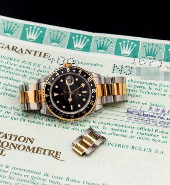 Rolex GMT-Master II Two-Tone Yellow Gold & Steel Black Dial 16713 w/ Original Paper - The Vintage Concept