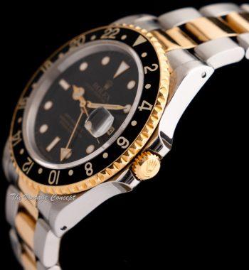 Rolex GMT-Master II Two-Tone Yellow Gold & Steel Black Dial 16713 w/ Original Paper - The Vintage Concept
