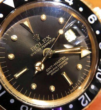 Rolex GMT-Master 18K Yellow Gold Black Grey Nipple Dial 1675 - The Vintage Concept