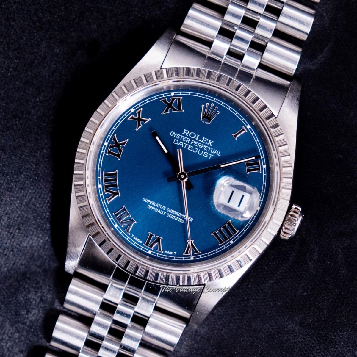 Rolex Steel Oyster Perpetual Datejust Blue Roman Indexes Dial 16220 w/ Original Paper (SOLD)