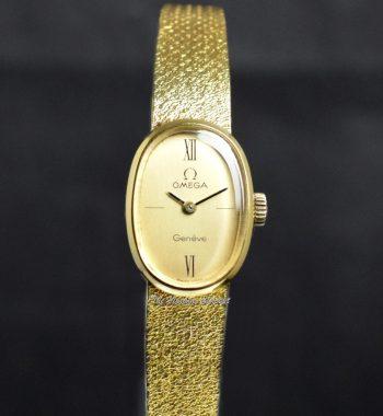 Omega Lady 18K Yellow Gold Oval Gold Dial Manual Wind Cocktail Watch (SOLD) - The Vintage Concept