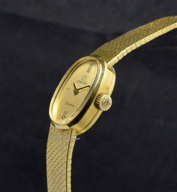 Omega Lady 18K Yellow Gold Oval Gold Dial Manual Wind Cocktail Watch (SOLD) - The Vintage Concept