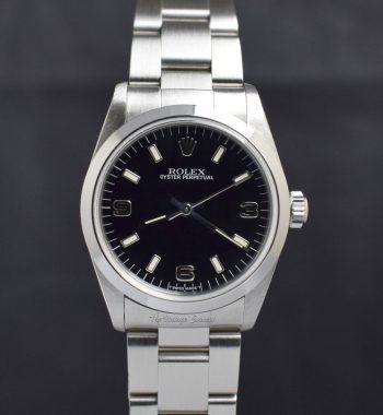 Rolex Steel Oyster Perpetual Black 3,6,9 Dial 67480 - The Vintage Concept