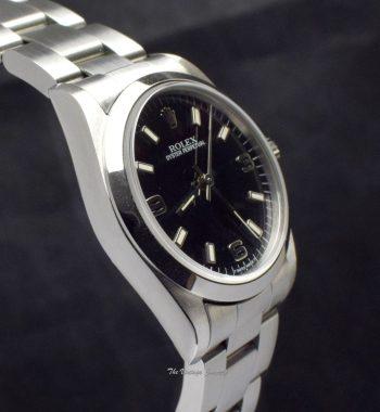 Rolex Steel Oyster Perpetual Black 3,6,9 Dial 67480 - The Vintage Concept