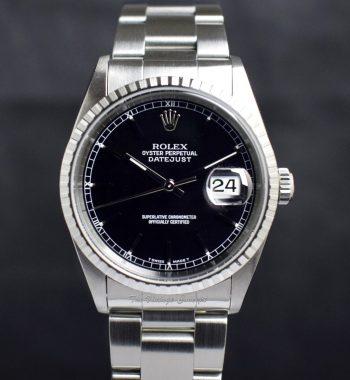 Rolex Steel Datejust Black Dial 16220 w/ Original Paper (SOLD) - The Vintage Concept