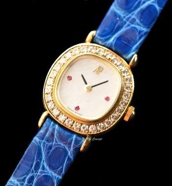 Audemars Piguet Lady 18K Yellow Gold Mother of Pearl Dial Ruby Indexes Diamonds Manual 77150BA w/ Original Paper