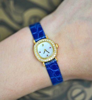 Audemars Piguet Lady 18K Yellow Gold Mother of Pearl Dial Ruby Indexes Diamonds Manual 77150BA w/ Original Paper (SOLD) - The Vintage Concept